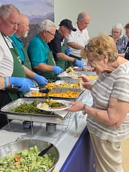 Paul serving Louise